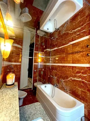 Salle de bains dans l'établissement L'appartement Vendome
