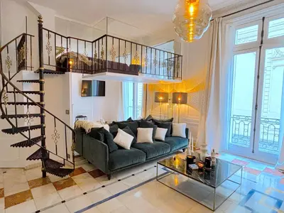 Coin salon dans l'établissement L'appartement Vendome