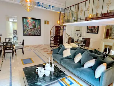 Coin salon dans l'établissement L'appartement Vendome