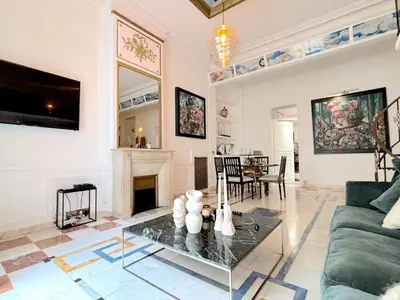 Télévision ou salle de divertissement dans l'établissement L'appartement Vendome