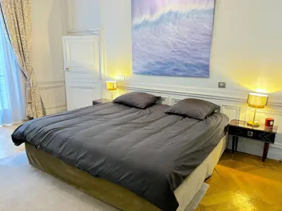Un ou plusieurs lits dans un hébergement de l'établissement L'appartement Vendome
