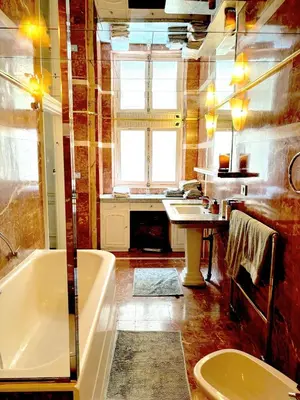 Salle de bains dans l'établissement L'appartement Vendome