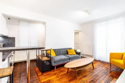 Coin salon dans l'établissement GuestReady - Appartement Confortable dans le 10e.