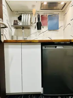 Cuisine ou kitchenette dans l'établissement Apparemment Tour Eiffel- La Motte Picquet Grenelle