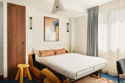 Un ou plusieurs lits dans un hébergement de l'établissement Edgar Suites Montrouge