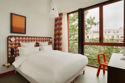 Un ou plusieurs lits dans un hébergement de l'établissement Edgar Suites Montrouge