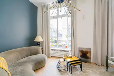 Coin salon dans l'établissement Stylish Flat Close to Louvre & Palais-Royal