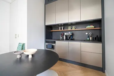 Cuisine ou kitchenette dans l'établissement Stylish Flat Close to Louvre & Palais-Royal