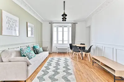 Coin salon dans l'établissement Appartement Vue sur Tour effeil Defense