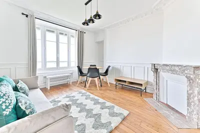 Coin salon dans l'établissement Appartement Vue sur Tour effeil Defense