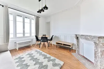 Coin salon dans l'établissement Appartement Vue sur Tour effeil Defense