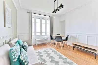 Coin salon dans l'établissement Appartement Vue sur Tour effeil Defense