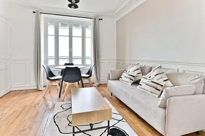 Coin salon dans l'établissement Appartement Spacieux Vue sur Paris Boulogne