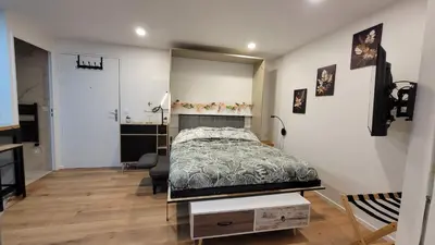 Un ou plusieurs lits dans un hébergement de l'établissement Cosy Apartment Kremlin Bicetre Metro Station