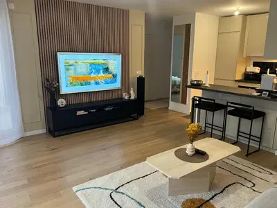 Télévision ou salle de divertissement dans l'établissement Beautiful 1 bedroom apartment in Paris 17 - Clichy