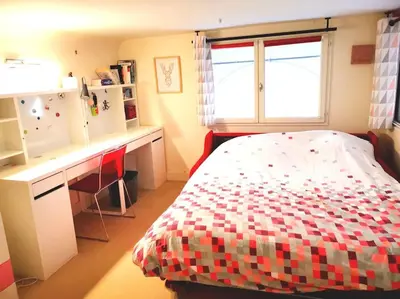 Un ou plusieurs lits dans un hébergement de l'établissement Beautiful quiet family loft Paris