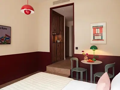 Un ou plusieurs lits dans un hébergement de l'établissement Numa Paris Champs-Élysées