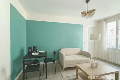 Coin salon dans l'établissement Flexliving - One bedroom - Fécamp