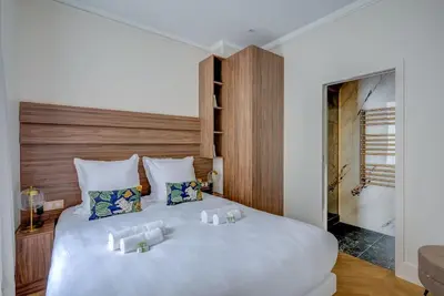 Un ou plusieurs lits dans un hébergement de l'établissement Elegant family apartment - REX - With AC