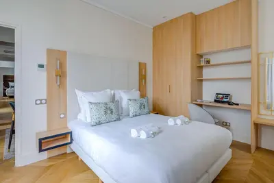 Un ou plusieurs lits dans un hébergement de l'établissement Elegant family apartment - REX - With AC