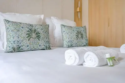 Un ou plusieurs lits dans un hébergement de l'établissement Elegant family apartment - REX - With AC
