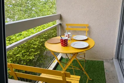 Balcon ou terrasse dans l'établissement Relax-Parc des expos-Wifi by La clé des expos