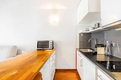 Cuisine ou kitchenette dans l'établissement GuestReady - Séjour Idéal près du Musée du Louvre