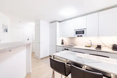 Cuisine ou kitchenette dans l'établissement GuestReady - Séjour Moderne à Issy-les-Moulineaux