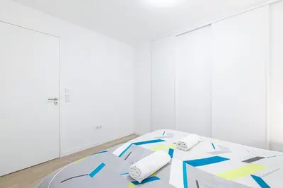Un ou plusieurs lits dans un hébergement de l'établissement GuestReady - Séjour Moderne à Issy-les-Moulineaux