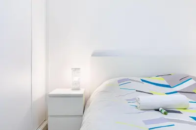 Un ou plusieurs lits dans un hébergement de l'établissement GuestReady - Séjour Moderne à Issy-les-Moulineaux