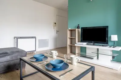 Télévision ou salle de divertissement dans l'établissement Appartement Crista - Welkeys