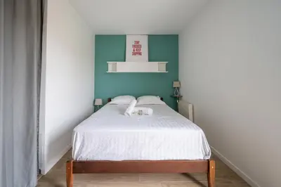 Un ou plusieurs lits dans un hébergement de l'établissement Appartement Crista - Welkeys