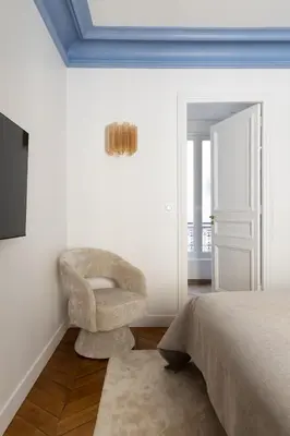 Un ou plusieurs lits dans un hébergement de l'établissement Champs Élysées Montaigne Luxury 2 bedroom