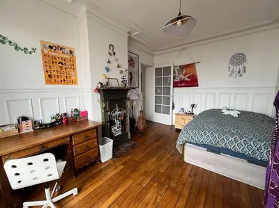 Un ou plusieurs lits dans un hébergement de l'établissement Paris park view 5 bedrooms familly subway 6