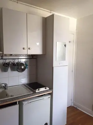 Cuisine ou kitchenette dans l'établissement Paris top location