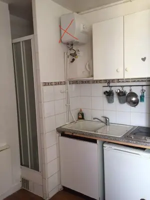 Cuisine ou kitchenette dans l'établissement Paris top location