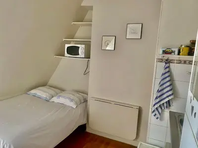 Un ou plusieurs lits dans un hébergement de l'établissement Paris top location