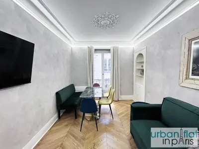 Télévision ou salle de divertissement dans l'établissement Urban Flat 180 - Charmant Appartement au coeur du Marais