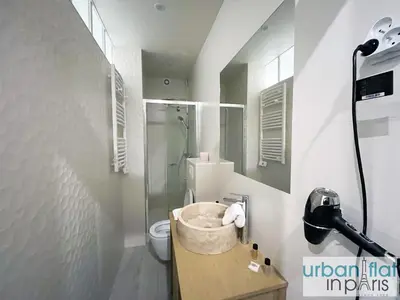 Salle de bains dans l'établissement Urban Flat 180 - Charmant Appartement au coeur du Marais