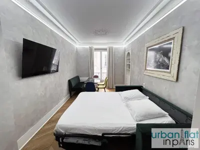Télévision ou salle de divertissement dans l'établissement Urban Flat 180 - Charmant Appartement au coeur du Marais