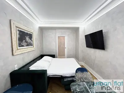 Télévision ou salle de divertissement dans l'établissement Urban Flat 180 - Charmant Appartement au coeur du Marais
