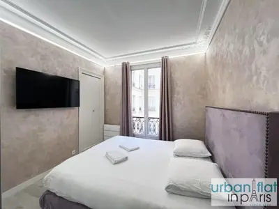 Un ou plusieurs lits dans un hébergement de l'établissement Urban Flat 180 - Charmant Appartement au coeur du Marais