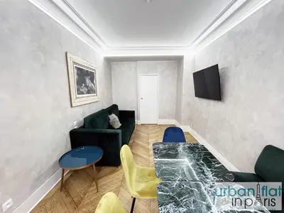 Télévision ou salle de divertissement dans l'établissement Urban Flat 180 - Charmant Appartement au coeur du Marais