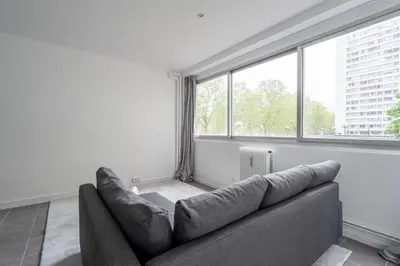 Coin salon dans l'établissement Appartement 2 Chambres - Porte de Choisy