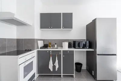 Cuisine ou kitchenette dans l'établissement Appartement 2 Chambres - Porte de Choisy