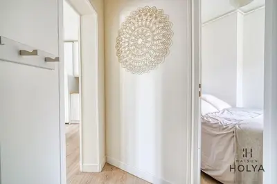 Un ou plusieurs lits dans un hébergement de l'établissement Quartier des Ternes - Le Rêveur - 137MB
