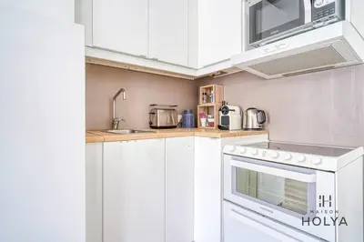 Cuisine ou kitchenette dans l'établissement Quartier des Ternes - Le Rêveur - 137MB