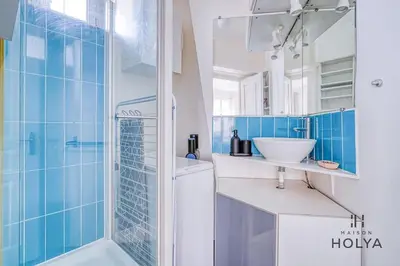 Salle de bains dans l'établissement Quartier des Ternes - Le Rêveur - 137MB