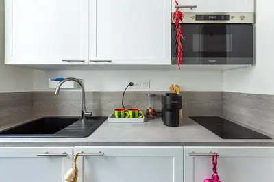 Cuisine ou kitchenette dans l'établissement 2 pièces-Moderne-Proche Paris