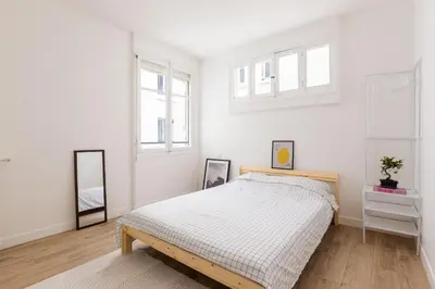 Un ou plusieurs lits dans un hébergement de l'établissement 2 pièces-Moderne-Proche Paris